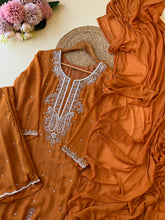 Chinnon hand worked party wear-rust
