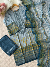 Self Embroidered greyish blue suit