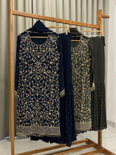 Heavy hand-worked suit with wide sharara