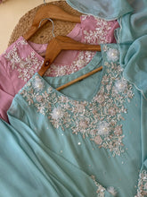 Chinnon handworked suit with Neck detailings