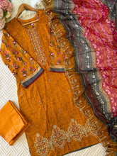 Pure cotton suit with embroidered top and dupatta-Orange