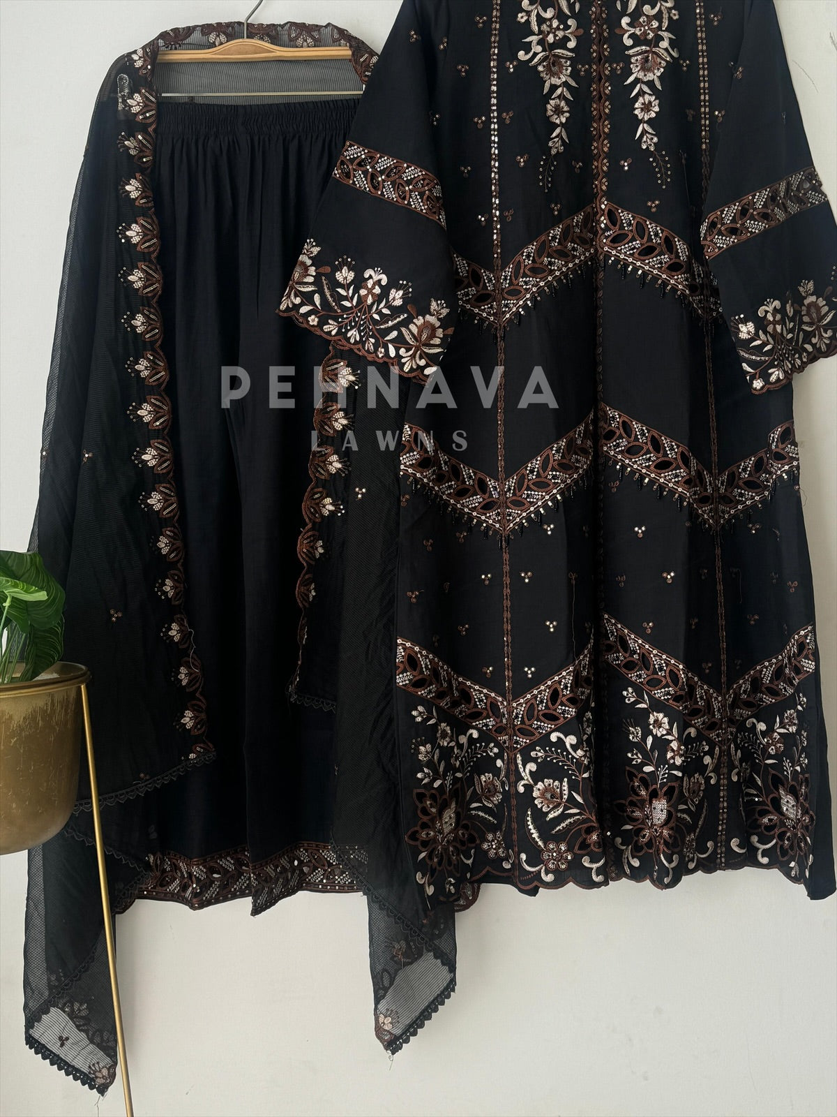 Pakistani jacket style cutwork suit