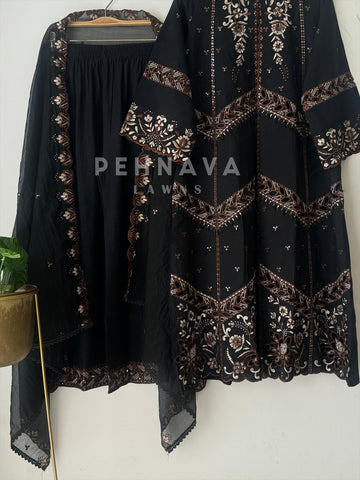 Pakistani jacket style cutwork suit