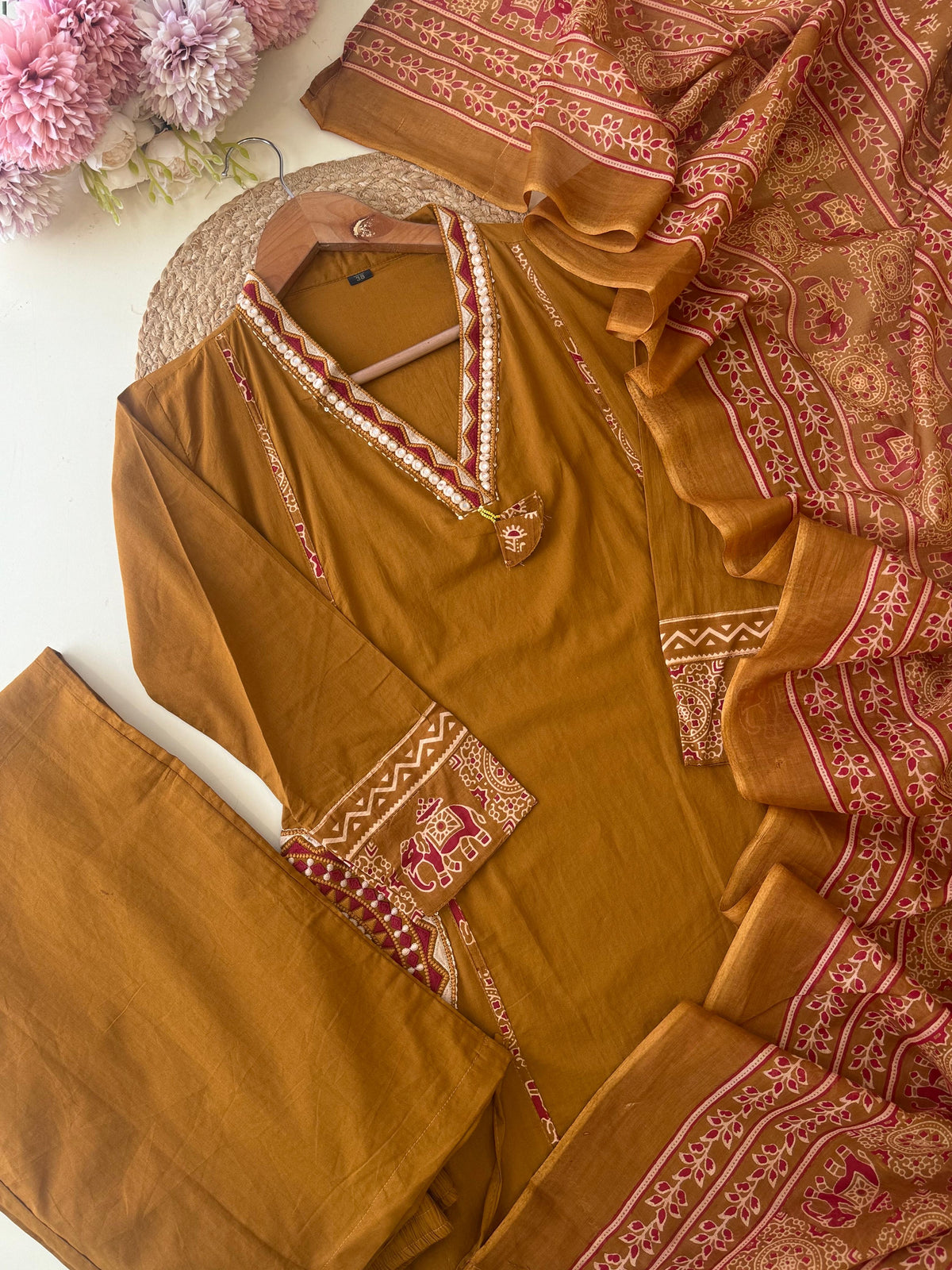 Pure Cotton suit Featuring Embroidered Hand detailings