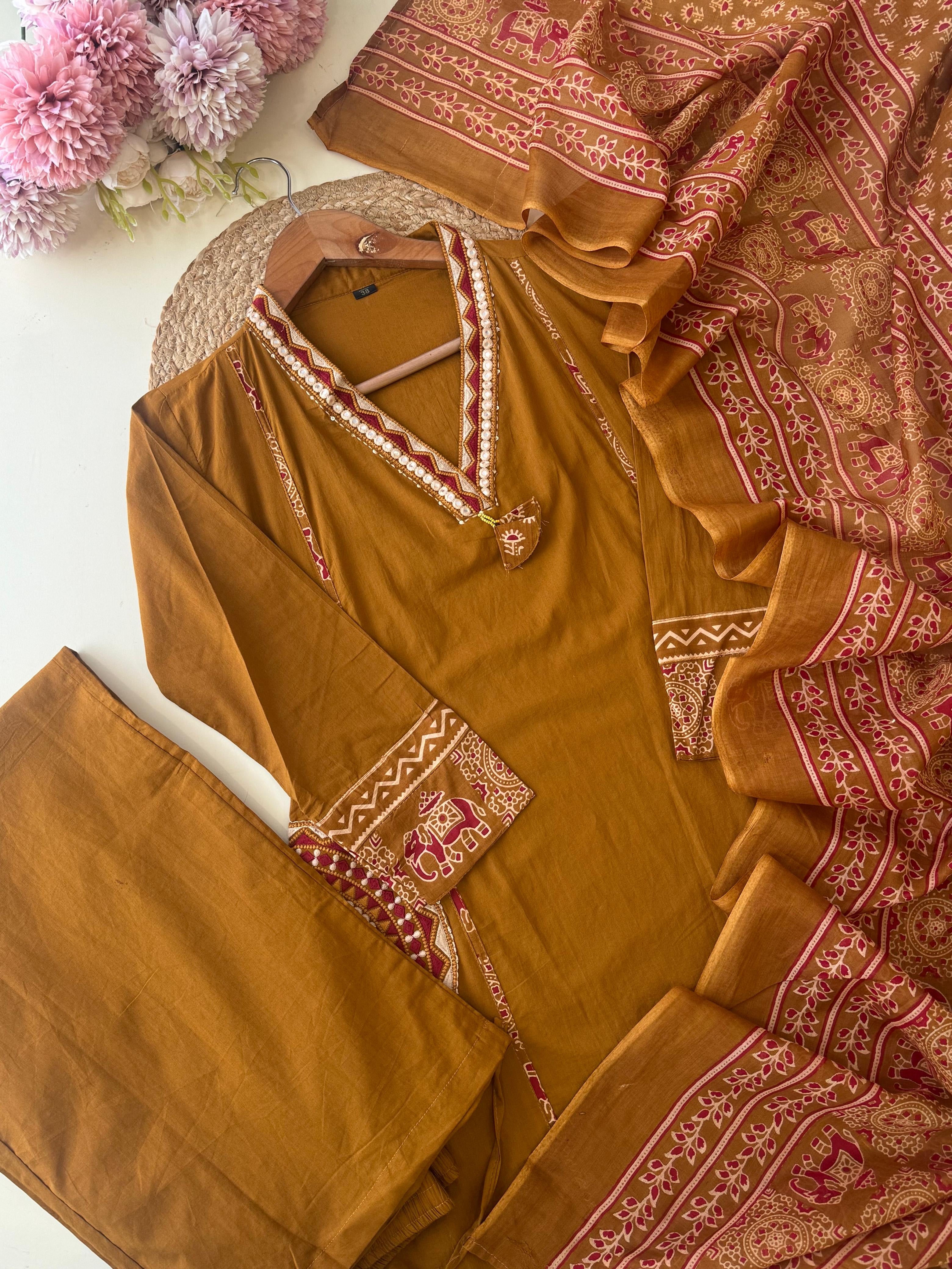 Pure Cotton suit Featuring Embroidered Hand detailings