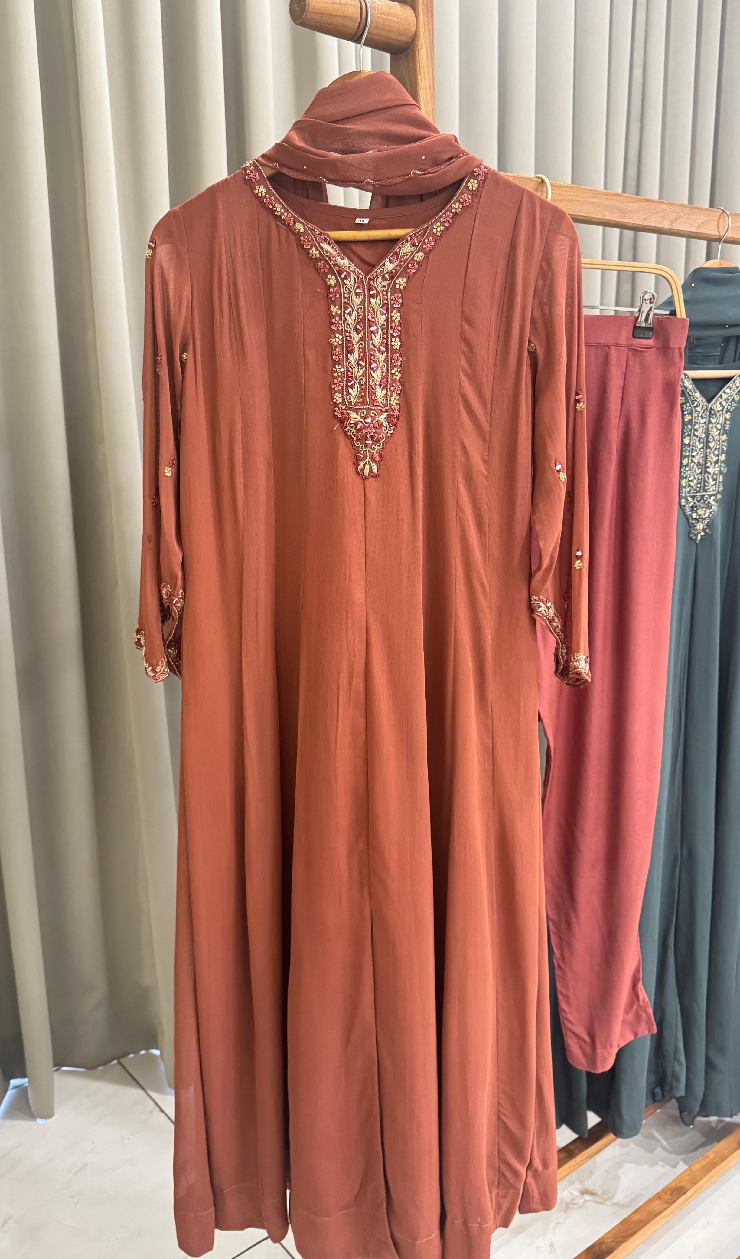 Full-flaired front slitted Gown with hand and Neck detailings
