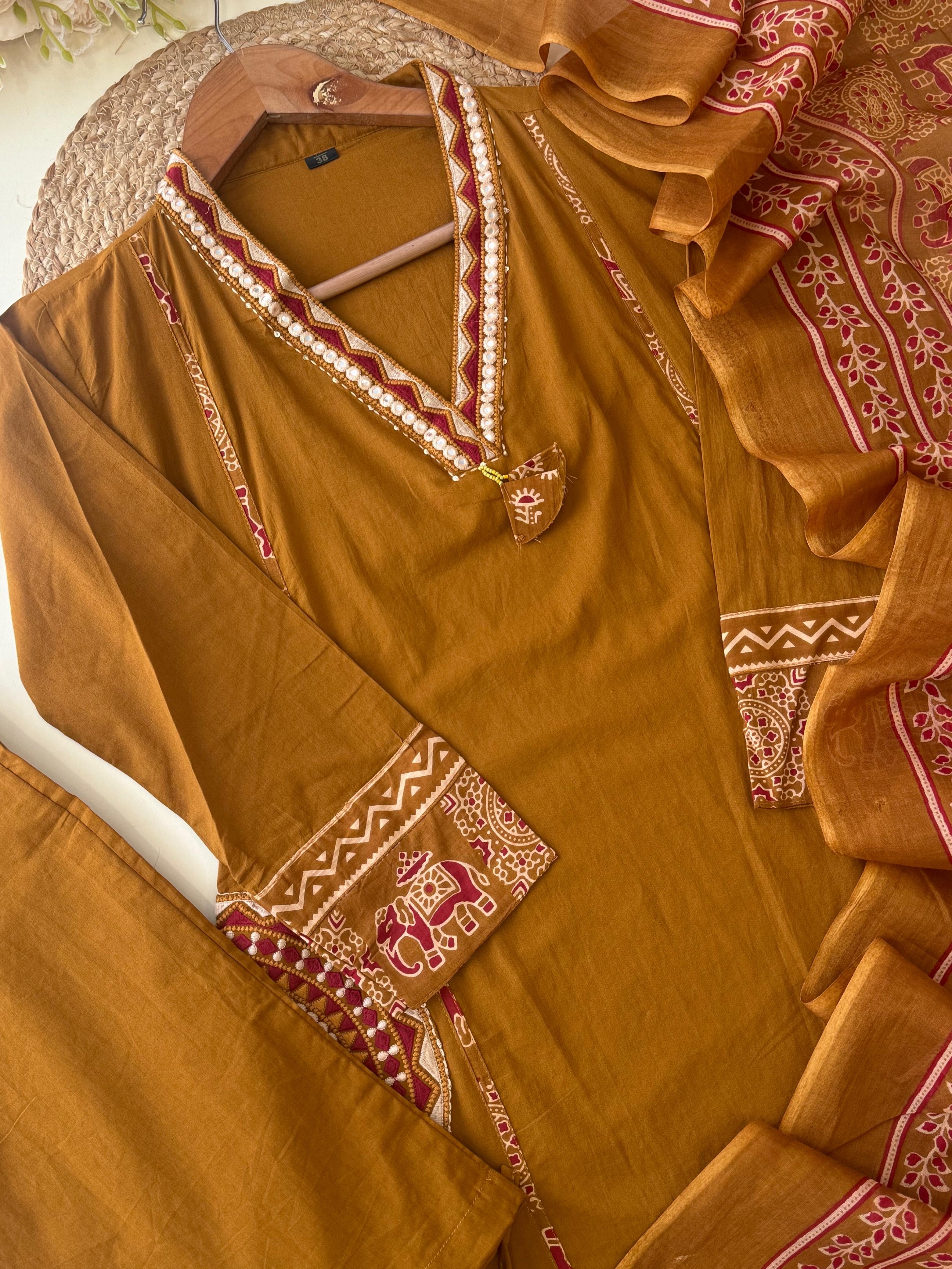 Pure Cotton suit Featuring Embroidered Hand detailings