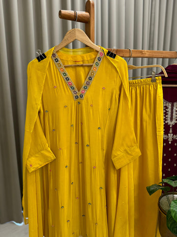 Elegant Crepe embroidered Yellow suit featuring modern flair