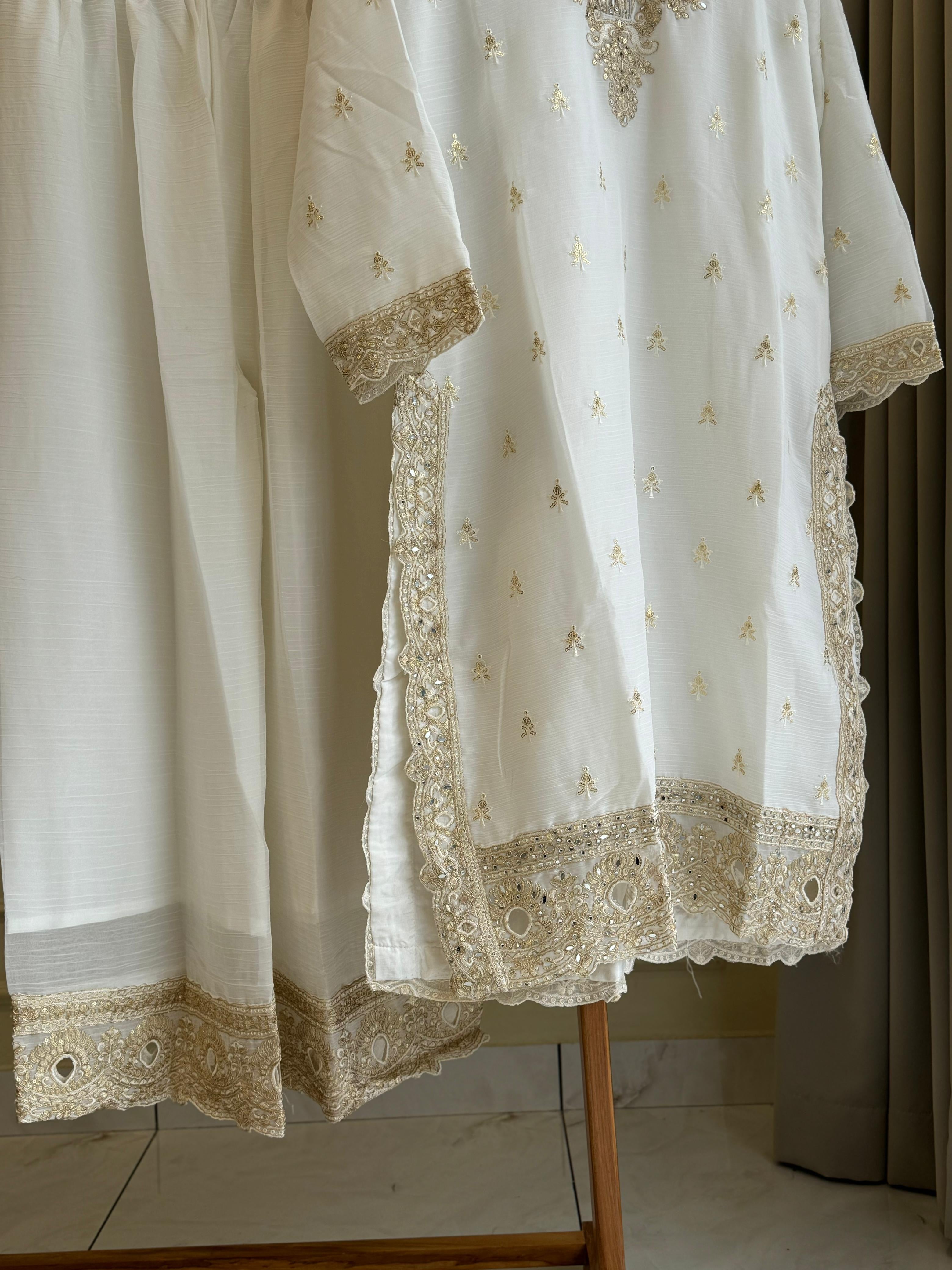 Chinnon Party wear suit with lace detailings