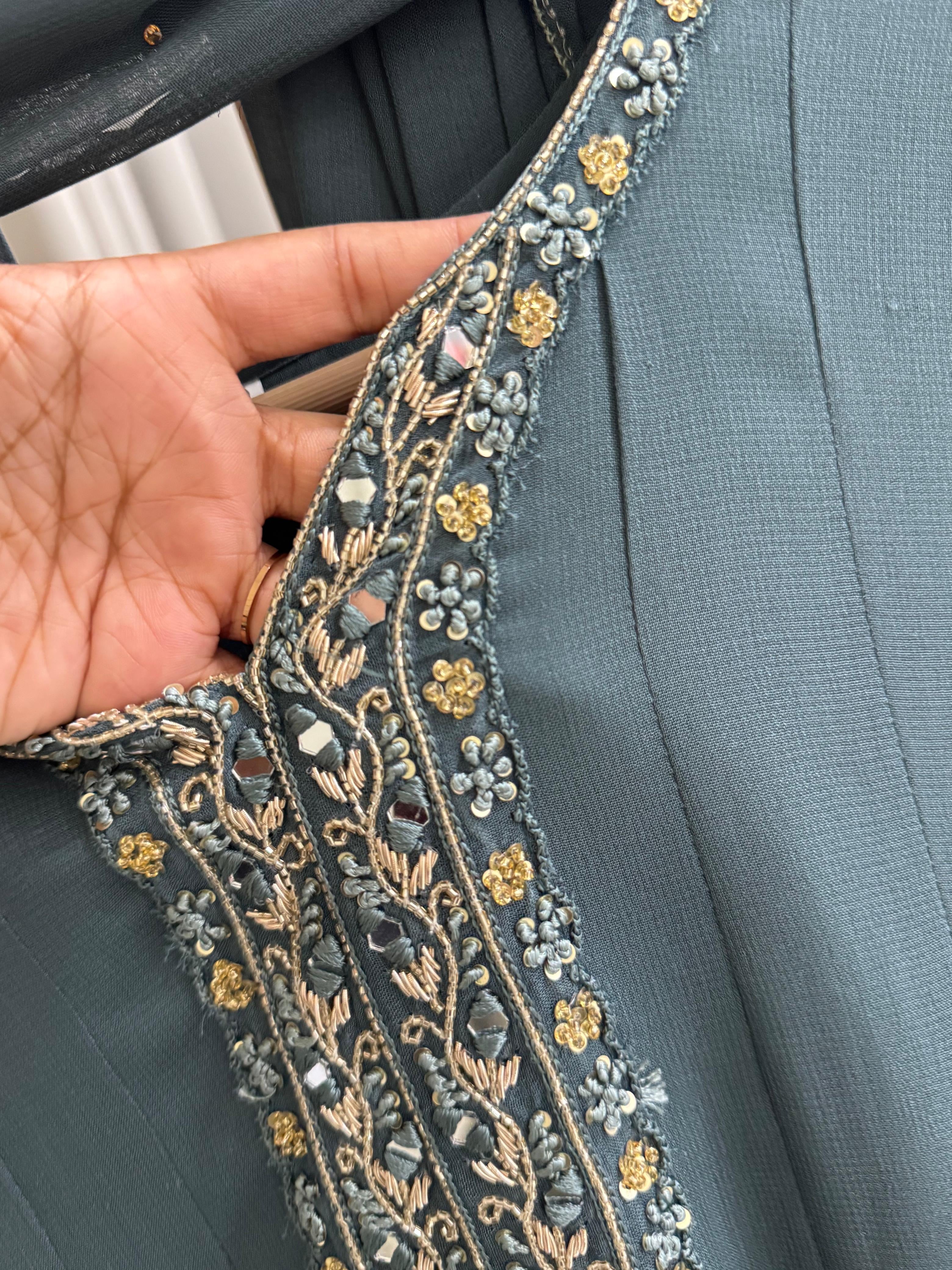 Full-flaired front slitted Gown with hand and Neck detailings