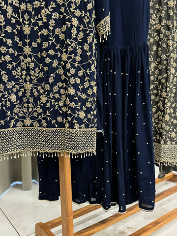 Heavy hand-worked suit with wide sharara