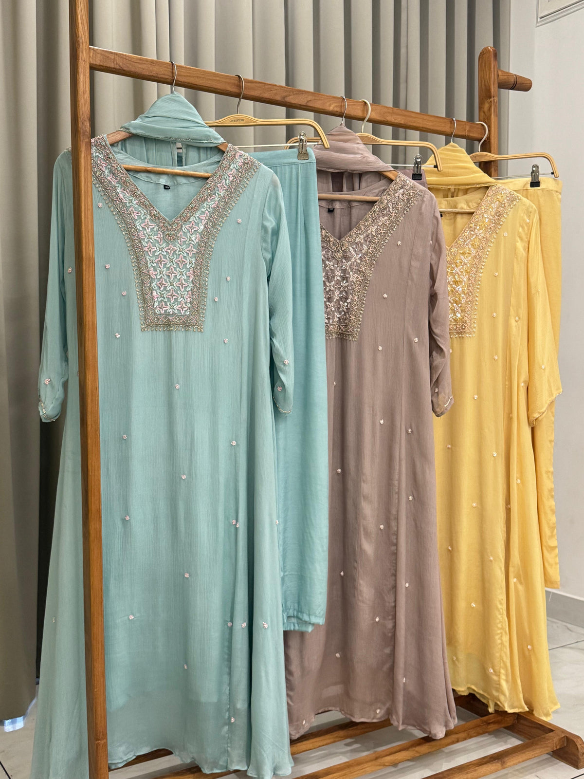 Chinnon ready to wear suit with Neck detailings