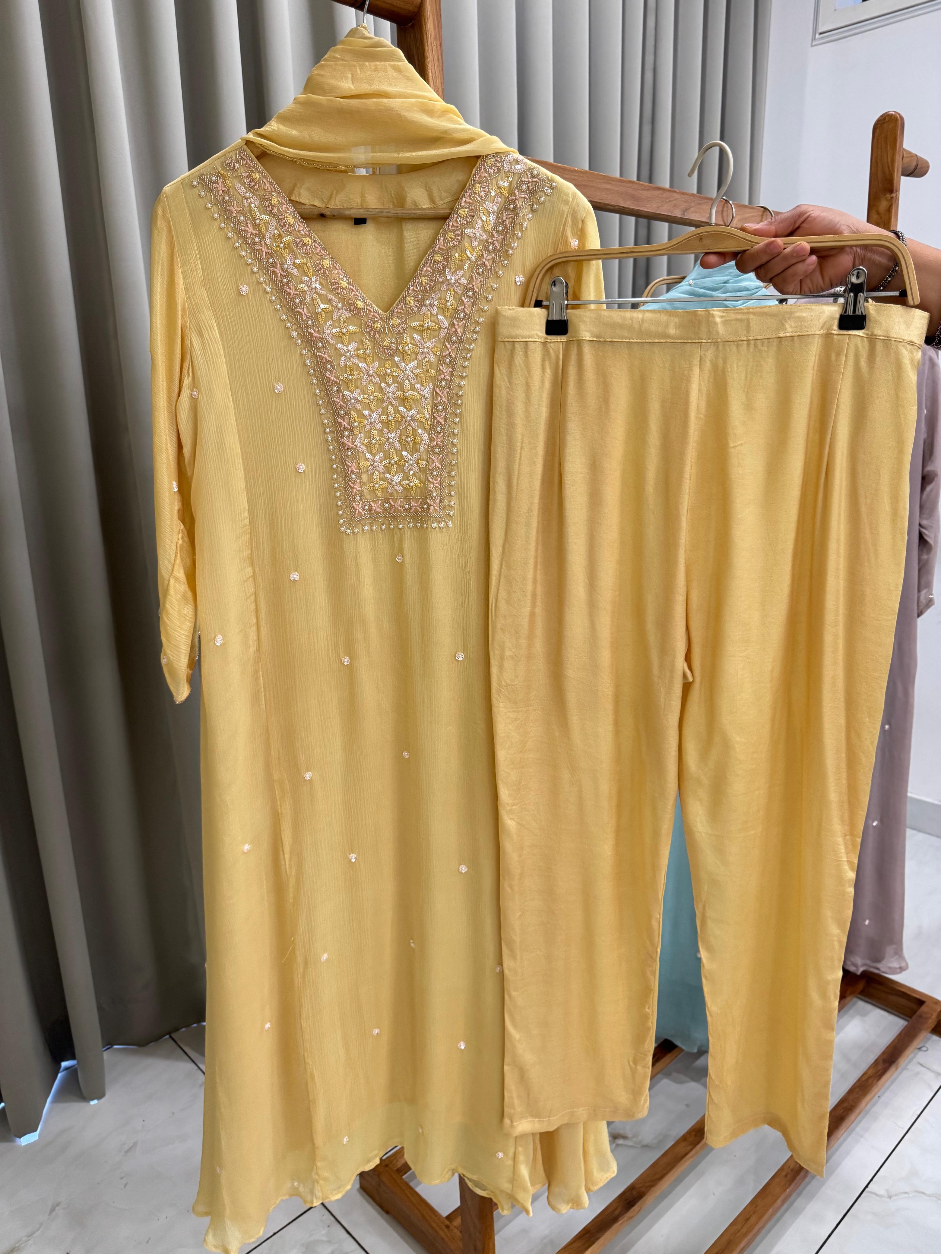 Chinnon ready to wear suit with Neck detailings