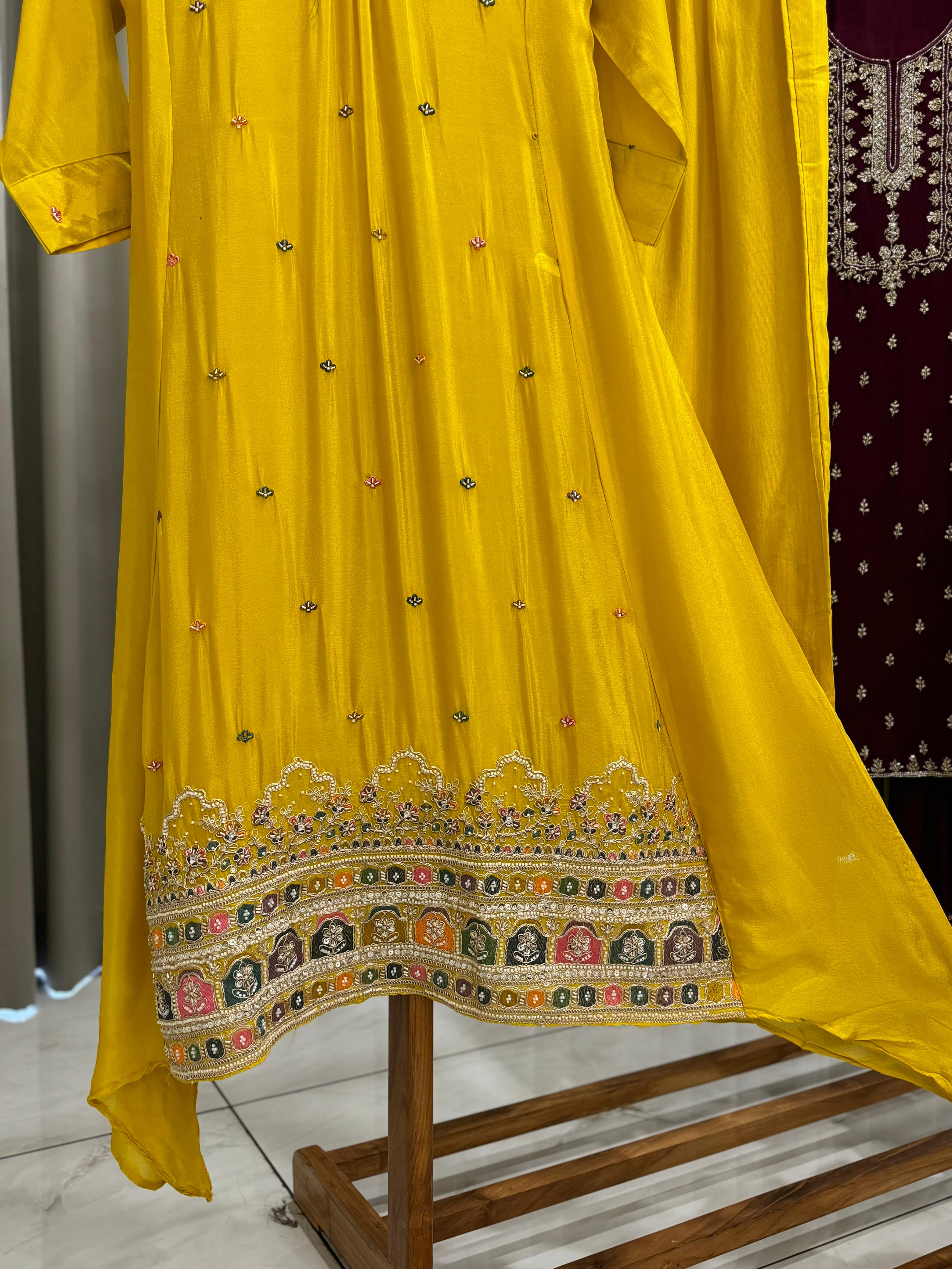 Elegant Crepe embroidered Yellow suit featuring modern flair