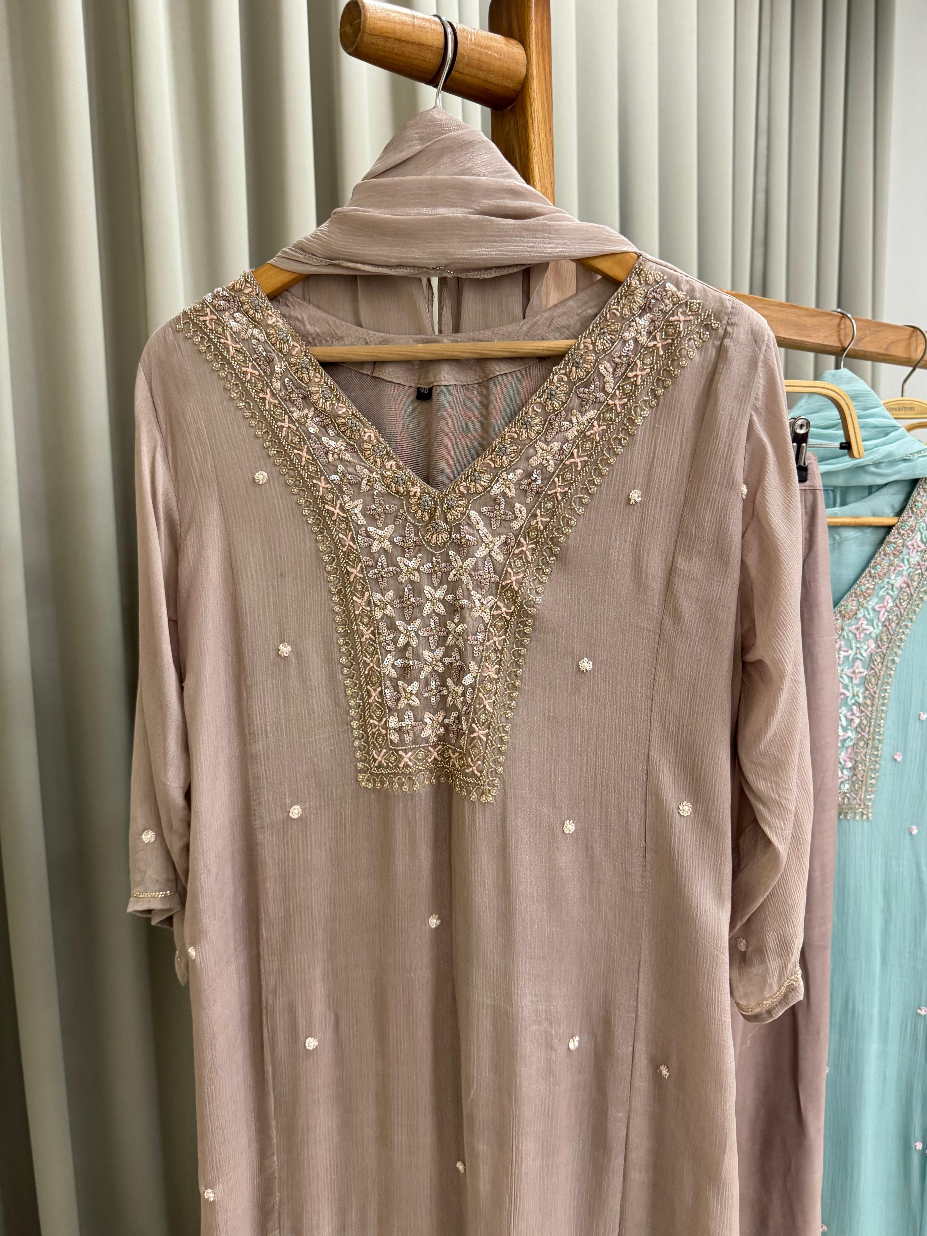 Chinnon ready to wear suit with Neck detailings