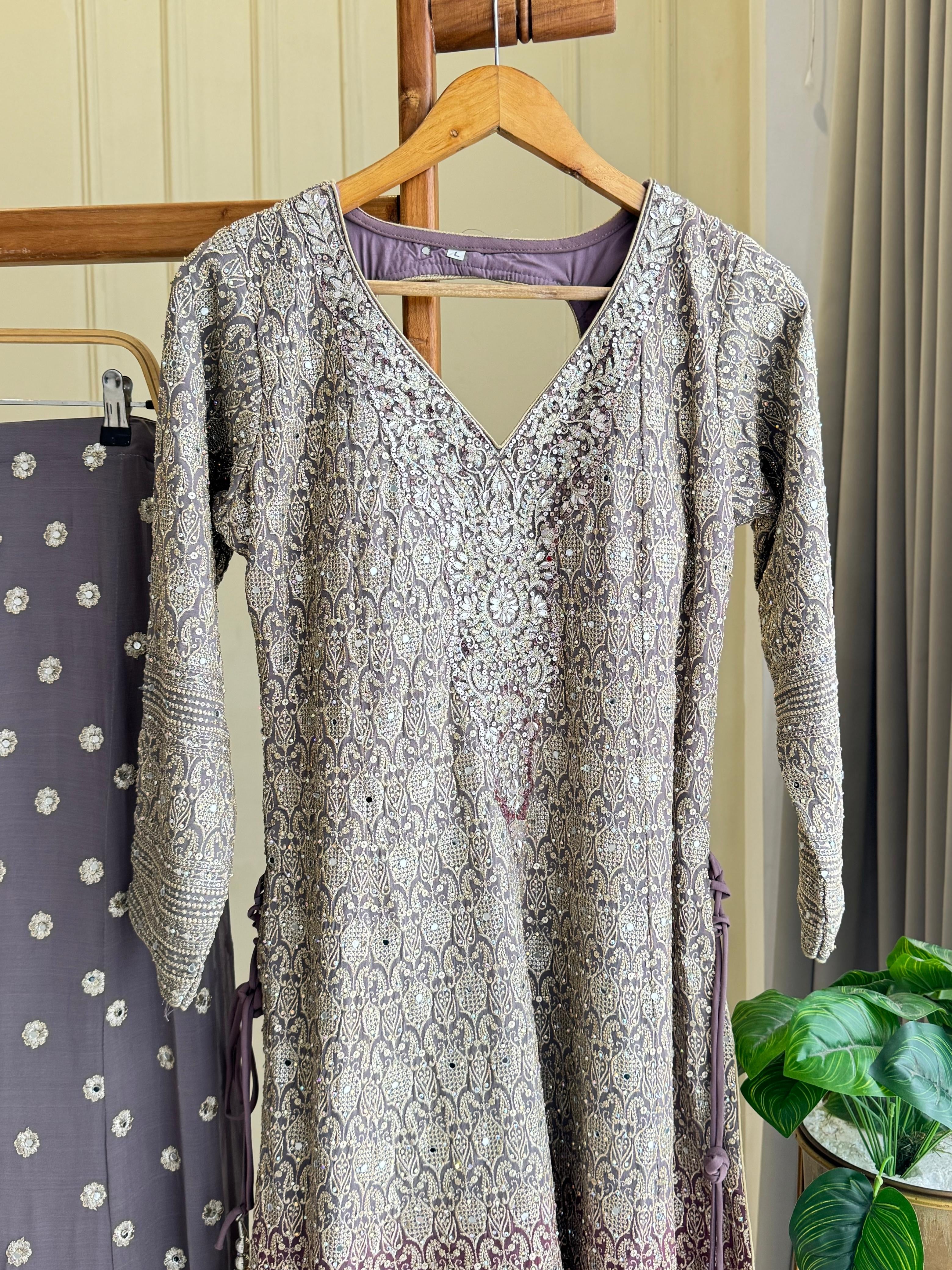Heavy handworked peplum dress