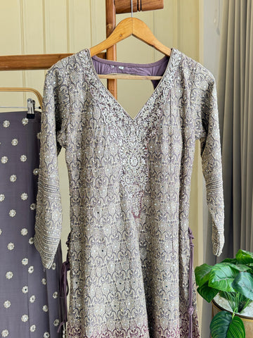 Heavy handworked peplum dress