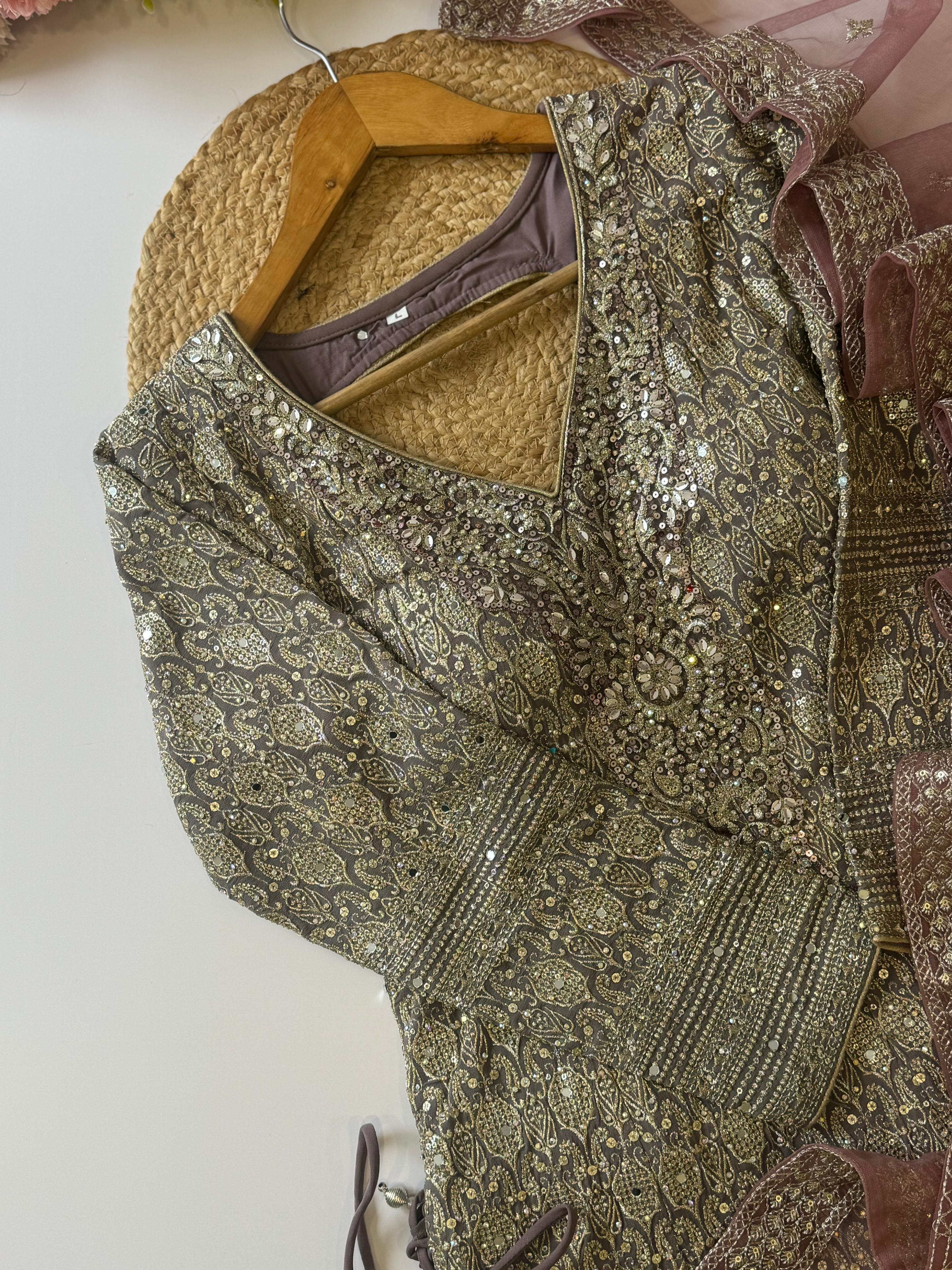 Heavy handworked peplum dress