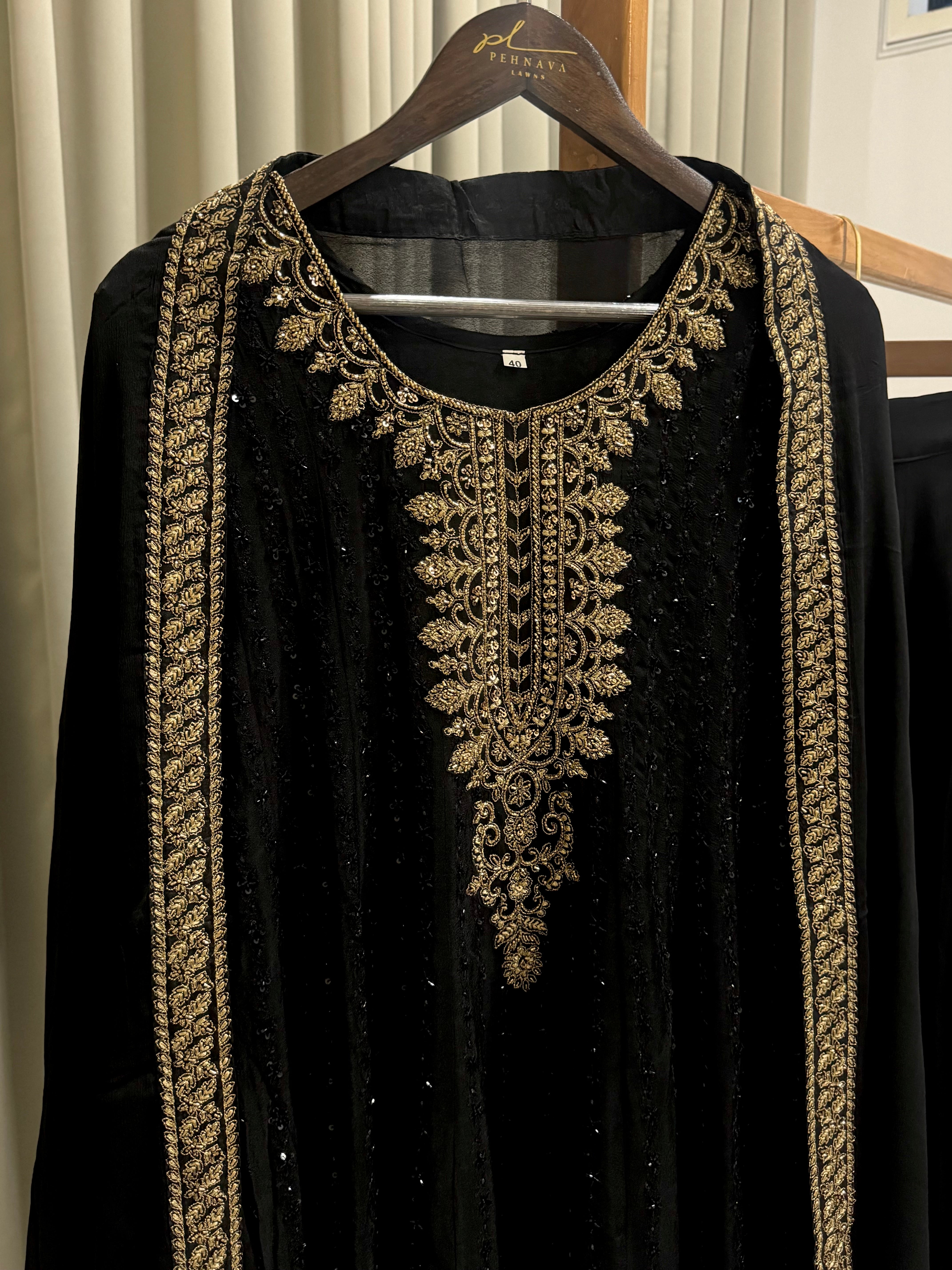 Handworked peplum style dress with skirt