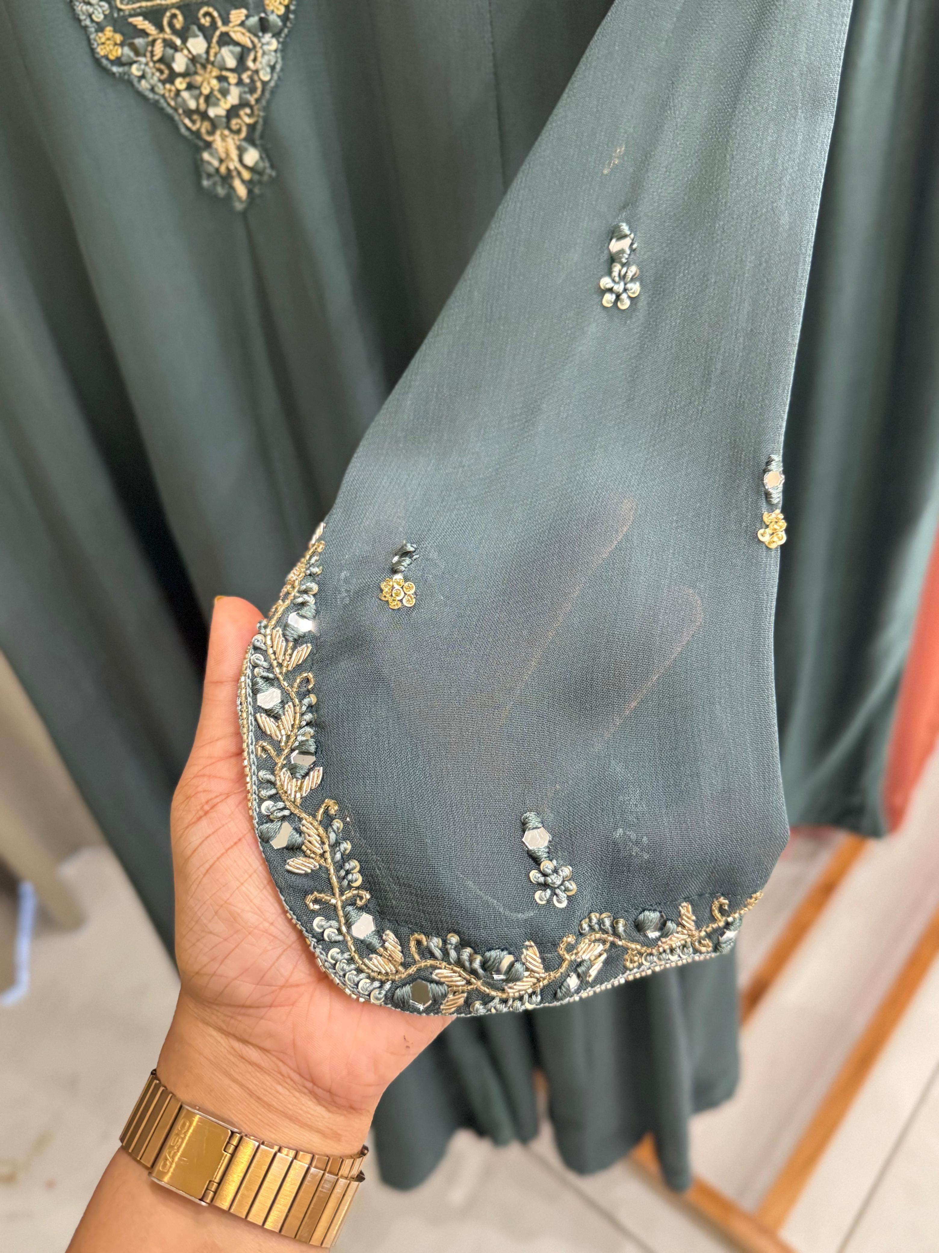 Full-flaired front slitted Gown with hand and Neck detailings