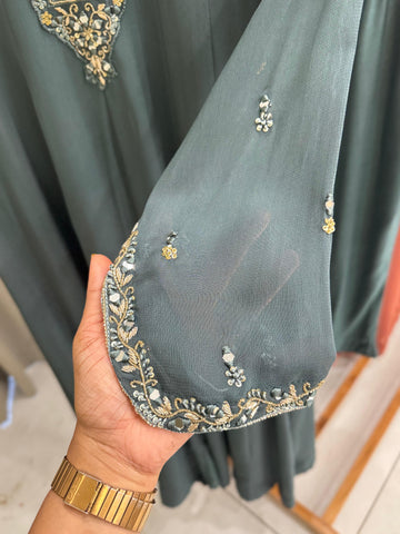 Full-flaired front slitted Gown with hand and Neck detailings