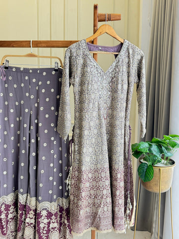 Heavy handworked peplum dress