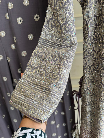 Heavy handworked peplum dress