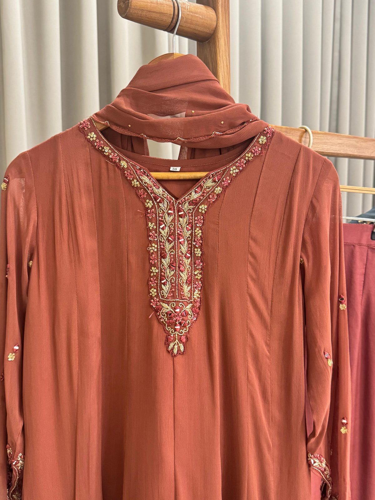 Full-flaired front slitted Gown with hand and Neck detailings