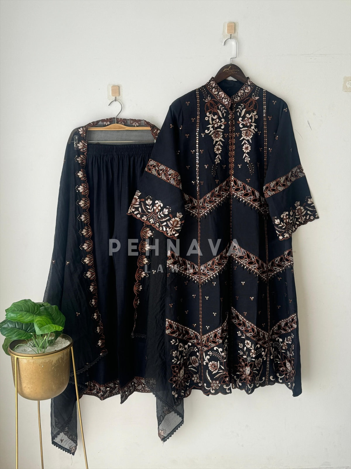Pakistani jacket style cutwork suit