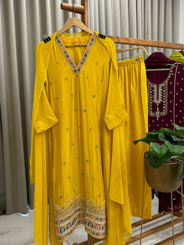 Elegant Crepe embroidered Yellow suit featuring modern flair