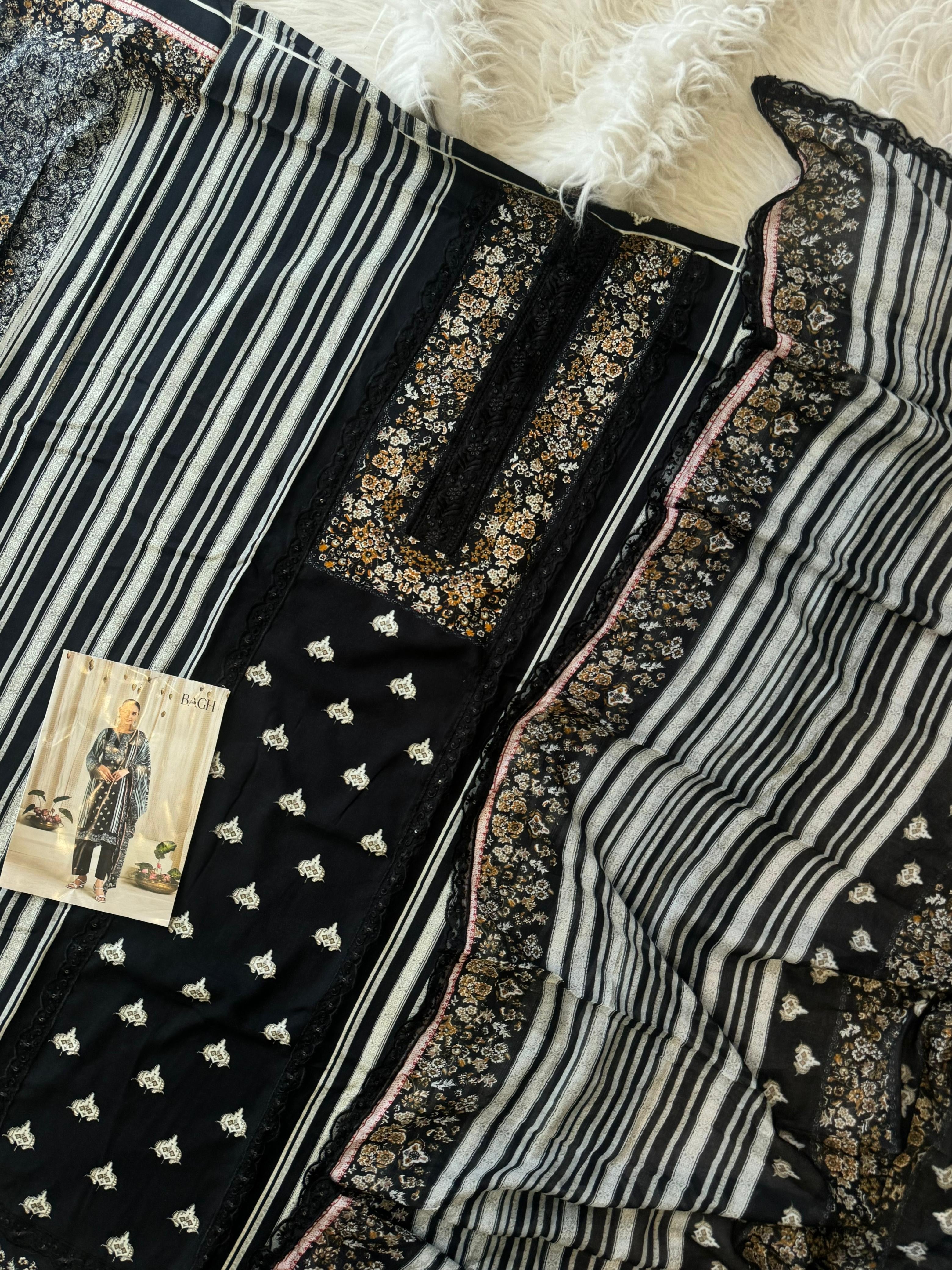 Rayon Embroidered Suit Ft. Delicate Lace Works
