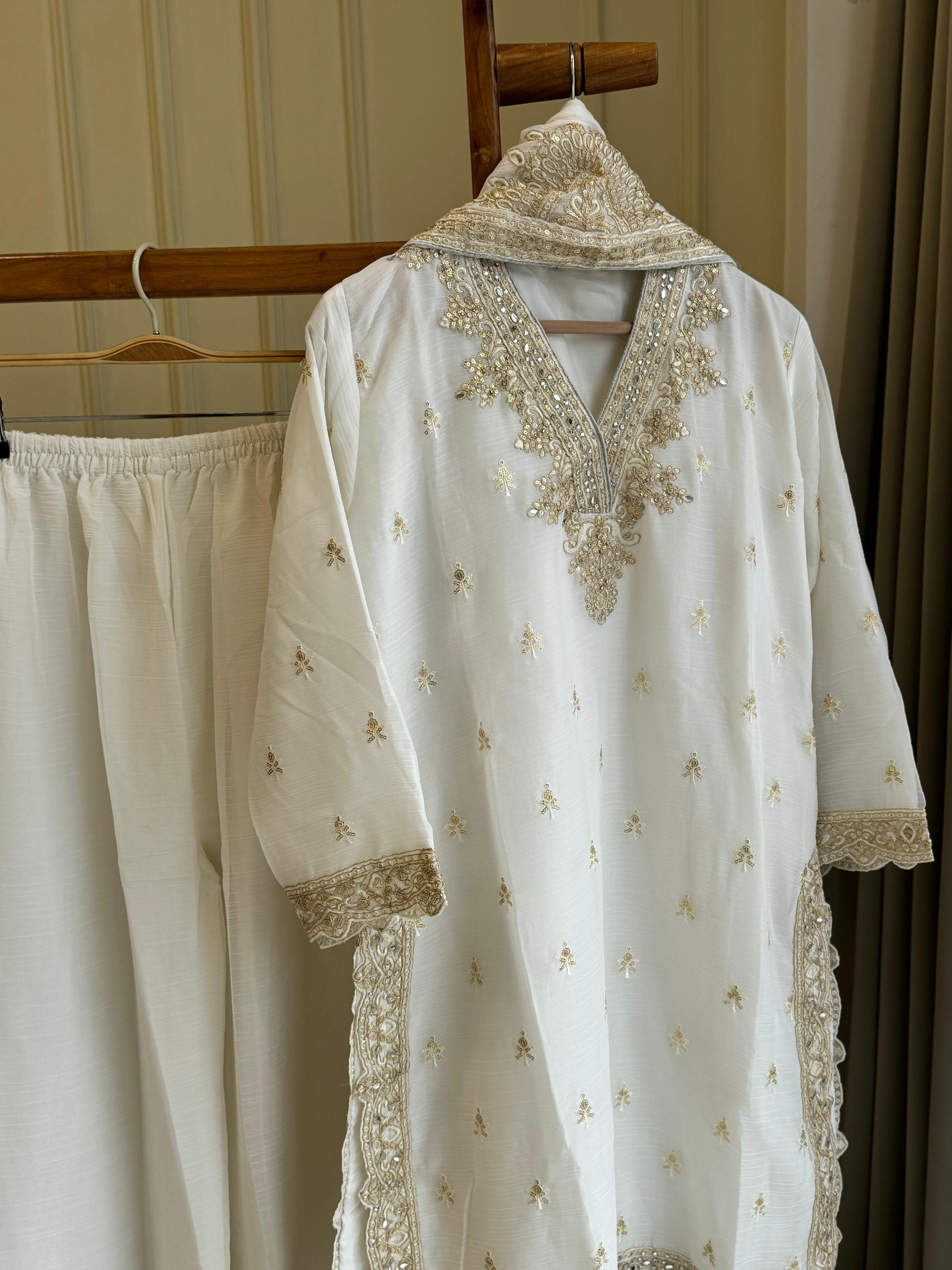 Chinnon Party wear suit with lace detailings