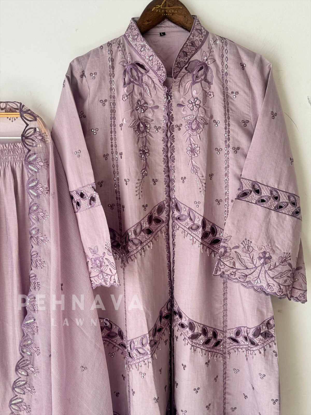 Pakistani jacket style cutwork suit